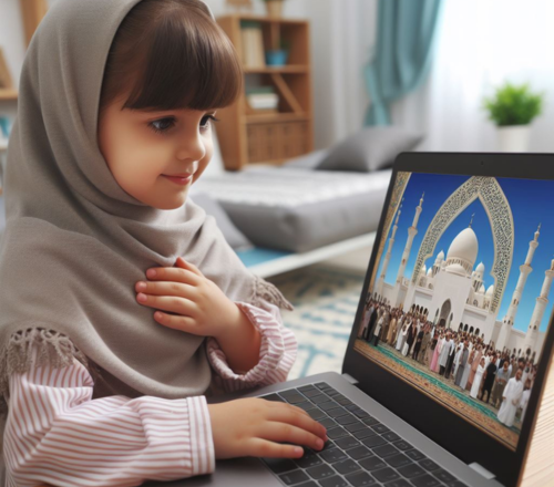 A young girl in a hijab smiles while looking at a laptop screen displaying a mosque.