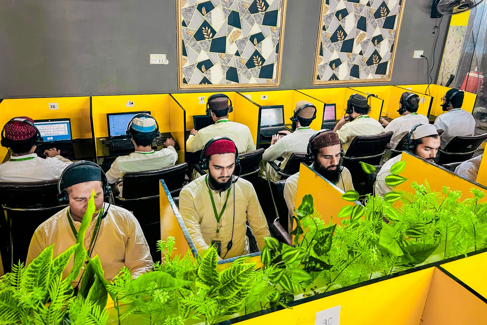 Alhamd Quran teachers assisting students during class